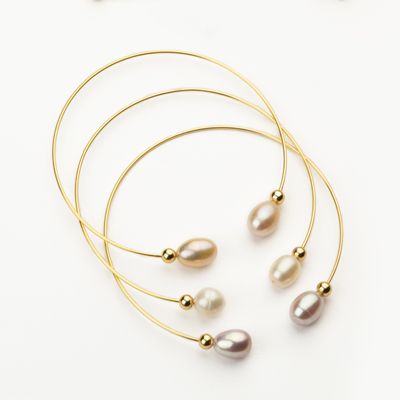 Barbieri Set 3 Bracciali Metallo Dorato e Perle